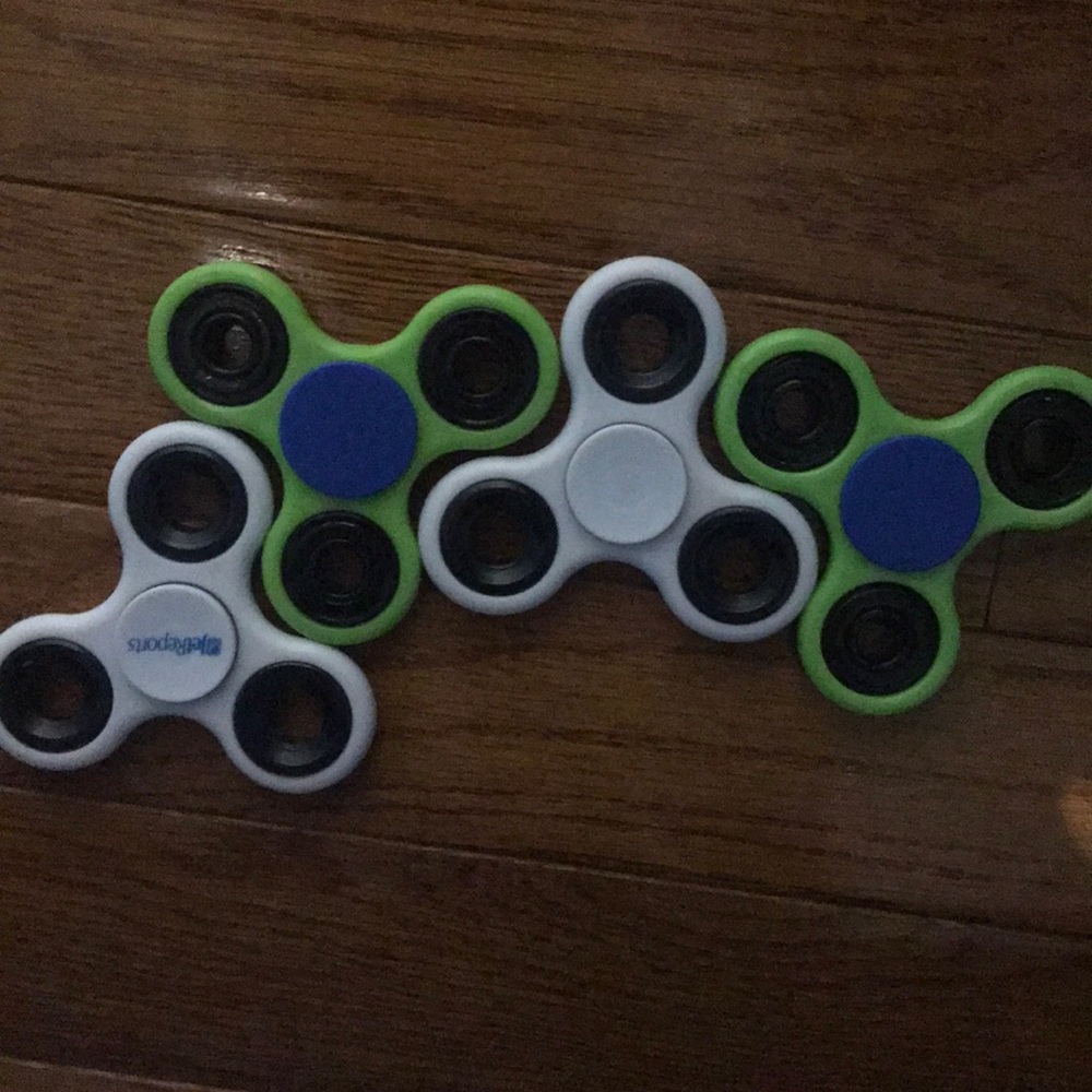 Four fidget spinners.